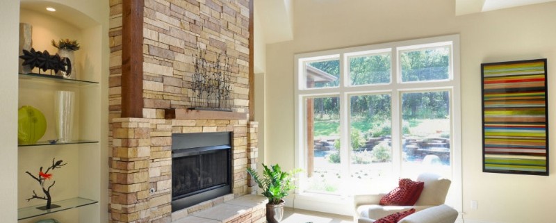Stone Fireplace and Pool Sterling Brook Custom Homes