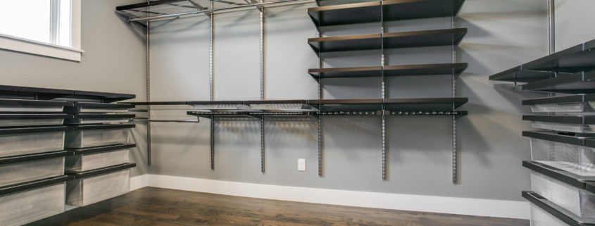 Master Closet with Container Store Storage System | Sterling Brook Custom Homes | DFW Custom Home Builder